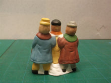 3 christmas carolers table decor