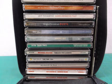lot of 16 assorted cd's with case