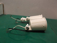 2 light sockets off a idc flood lights motion light