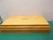 set of poker chips in wooden storage box