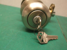 kwikset brushed nickel keyed rounded knob no hardware