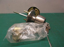 Defiant Nickel door knob with keys