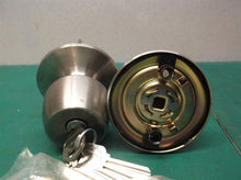 Defiant Nickel door knob with keys