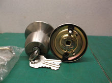 Defiant Nickel door knob with keys