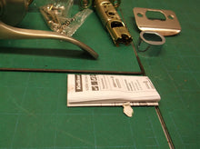 kwikset brushed nickel interior lever style door handle