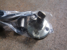 Assorted bronze door handle parts