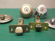assorted deadbolt & door knob parts