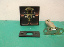 assorted black kwikset door knob parts