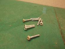 assorted screws off a Eureka HDUE2CR PowerSpeed Turbo Pet Cord Rewind