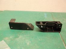 left & right cap off a NEU180 Eureka Powerspeed Lightweight Upright Vacuum