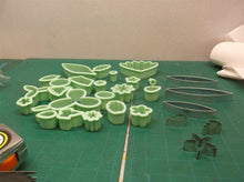 assorted lot of cookie cutters/chocolate molds