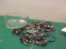 Glass heart shaped dish with costume jewelry