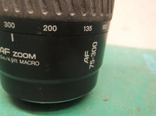 Minolta AF 75-300mm F/4.5-5.6 zoom lens. only