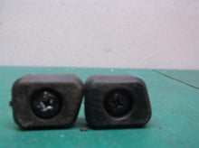 2 Backrest feet with screws from a GreenWorks GPW 1600 electric pressure washer