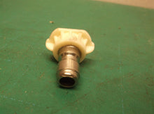 31240363 40 degree nozzle from a GreenWorks GPW 1600 electric pressure washer