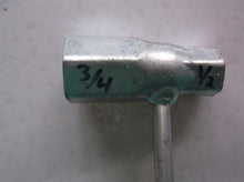 chainsaw tool 3/4 & 1/2 with flat head screwdriver