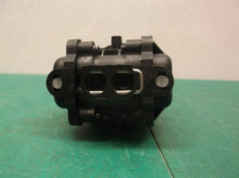 Pump assembly from a Ryobi RY120350 18 Volt EZ-CLEAN Power Cleaner