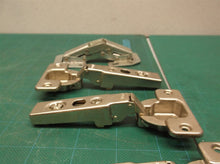 assorted cabinet hinge parts