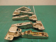 assorted cabinet hinge parts