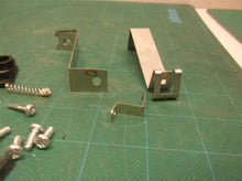 assorted hardware from a for a 59407a Georgia pacific paper towel dispenser