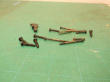 ASSORTED HARDWARE from a Dewalt DCF887 20V 3 Spd Impact Driver