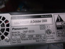 Panasonic DMP-BD35 Blu-Ray Player w Cord Power on Tested Working dented housing
