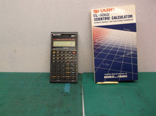vintage sharp el-506D Scientific calculator with manual