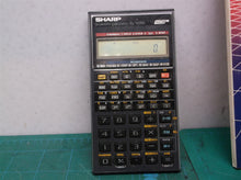 vintage sharp el-506D Scientific calculator with manual