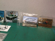 lot of metal plates of car shows and diners Swanton Libby's Kingman Street