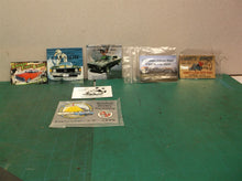 lot of metal plates of car shows and diners Swanton Libby's Kingman Street