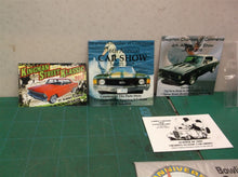 lot of metal plates of car shows and diners Swanton Libby's Kingman Street