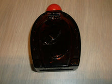 Avon Horse With Horseshoe Shaped Bottle
