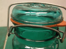 Vintage ball ideal canning jar with glass lid gasket is cracked
