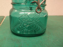 Vintage ball ideal canning jar with glass lid gasket is cracked