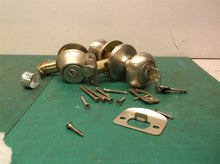 KWIKSET BRUSHED NICKLE DEADBOLT & DOOR KNOB WITH SOME HARDWARE