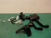 assorted lot of screen door handle parts