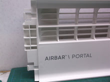 Front grill from a Sharper Image PORTAL Window Fan
