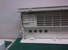 Front grill from a Sharper Image PORTAL Window Fan