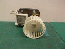 motor group off a Kenmore 10673206300 Refrigerator