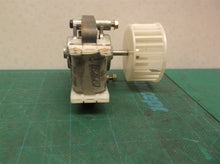 motor group off a Kenmore 10673206300 Refrigerator