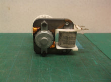 motor group off a Kenmore 10673206300 Refrigerator