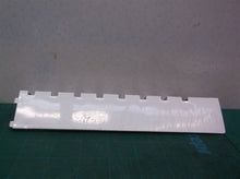 refrigerator ice maker cube ejector off a Kenmore 10673206300 Refrigerator