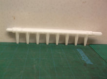 refrigerator ice maker cube ejector arm off a Kenmore 10673206300 Refrigerator