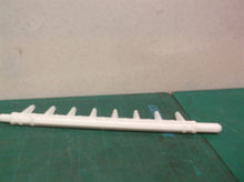 refrigerator ice maker cube ejector arm off a Kenmore 10673206300 Refrigerator