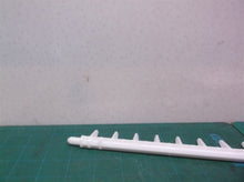 refrigerator ice maker cube ejector arm off a Kenmore 10673206300 Refrigerator