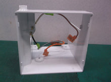 refrigerator ice maker evaporator and wires off a Kenmore 10673206300 housing