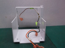 refrigerator ice maker evaporator and wires off a Kenmore 10673206300 housing