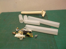 assorted ice maker tubes & hardware