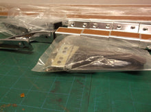 Bed rail for 5 to 8 foot pickup bed chrome/wood grain