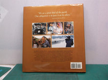 Women Photographers at National Geographic;- hardcover, Cathy Newman